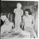 Herman Neubauer, one of the eight spies landed from German U-boat on a sabotage mission in the U.S., is under arrest in Chicago. In 1938 he was chef at a hotel here, where he carved this statue in butter using Betty Roberts as model. (Photo: Bettmann/Getty Images)